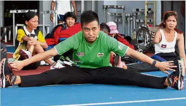  ??  ?? Game for a stretch: Malaysia’s Eddy Bernard at a training session in Bukit Jalil yesterday. He will feature in the men’s T37 (cerebral palsy) in the 100m and long jump.