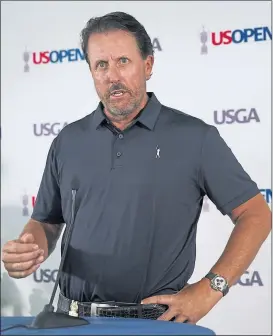 ?? ?? Mickelson was visibly uncomforta­ble during the press conference