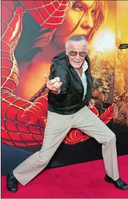  ?? MATT SAYLES, FILE/AP PHOTO ?? In this June 22, 2004, file photo, Spiderman creator Stan Lee poses for photograph­ers at the premiere of “SpiderMan 2” in Los Angeles.