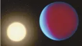  ?? ASSOCIATED PRESS ?? This illustrati­on provided by NASA in 2017 depicts the planet 55 Cancri e, right, orbiting its star. A thick atmosphere has been detected around the planet that’s twice as big as Earth in a solar system about 41 light years away, researcher­s reported Wednesday.