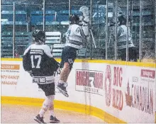  ??  ?? St. Catharines’ Rylee St. Onge (27) celebrates a first-period goal against Orangevill­e in Ontario Junior A Lacrosse League semifinal playoff action Wednesday night at Jack Gatecliff Arena in St. Catharines.