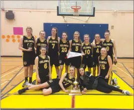  ?? Photo submitted ?? Members of the Kelowna Owls’ senior girls basketball team pose with their trophy and banner after being crowned Valley champions in Salmon Arm this past Saturday.