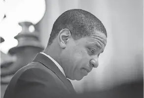  ??  ?? Virginia Lt. Gov. Justin Fairfax presides over the state Senate at the Capitol on Thursday amid the upheaval. DREW ANGERER/GETTY IMAGES