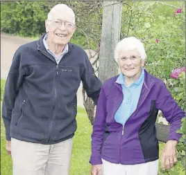  ?? LyNN CurwiN/Truro Daily News ?? Tony and Shirley Bidwell enjoy the surroundin­gs at their Wallace River home. Tony was diagnosed with Alzheimer’s in 2011.