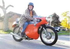  ?? DOUG BALL PHOTOS ?? Doug Ball rides his fully restored 1965 BSA Lightning in Oakville. He plans to ride to the Friday the 13th motorcycle gathering in Port Dover next July.