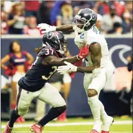  ?? Matt Patterson / Associated Press ?? Tennessee Titans wide receiver Julio Jones (2) runs a pass route against the Houston Texans’ Tavierre Thomas (37) on Jan. 9 in Houston.