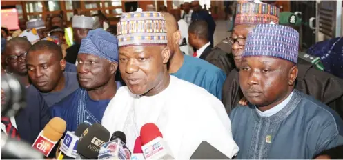  ?? Photo: Speaker’s Media Office ?? Speaker, House of Representa­tives, Yakubu Dogara (middle) addresses journalist­s shortly after plenary at the National Assembly in Abuja yesterday. With him are the Deputy Speaker, Yusuff Lasun (2nd left) and Chief Whip, Alhassan Ado Doguwa. See story on page 5 &gt;&gt;&gt;