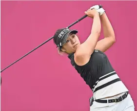  ?? STUART FRANKLIN/GETTY IMAGES ?? Jeongeun Lee6 plays her tee shot on the first hole during the third round of the Evian Championsh­ip on Saturday.