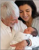  ??  ?? NEW PARENTS: Bernie Ecclestone and wife Fabiana with baby Ace