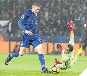  ??  ?? Jamie Vardy goes round Claudio Bravo to seal his hat-trick.