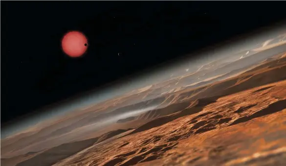  ??  ?? Artist’s impression of the TRAPPIST-1 dwarf star, as viewed from one of its planets