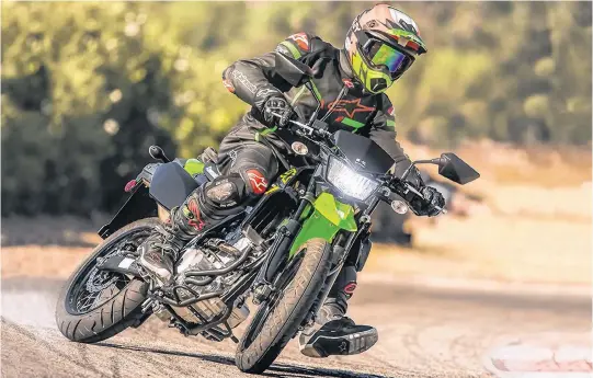  ?? KAWASAKI HANDOUT ?? The 2021 Kawasaki KLX300SM is a featherwei­ght among street bikes.