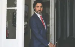  ?? JUSTIN TANG / THE CANADIAN PRESS ?? Prime Minister Justin Trudeau appears outside Rideau Cottage, his residence in
Ottawa, on Tuesday for his daily news conference on the COVID-19 pandemic.