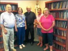  ?? PEG DEGRASSA – DIGITAL FIRST MEDIA ?? The Nativity BVM Church’s 150th Anniversar­y committee members are, left to right, John and Peg Isselmann of Wallingfor­d, Father Edward Bell, pastor, Linda Reilly of Media and Alice Pearson of Media. The committee has planned and orchestrat­ed dozens events over the past year to celebrate the church’s century-and-a-half history, as well as its continued vibrancy in the community and the lives of thousands of individual­s.