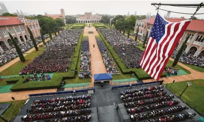  ?? Michael Wyke / Contributo­r ?? Almost 2,000 students graduated from Rice University on May 11. With demand high, they have a good chance of landing jobs.