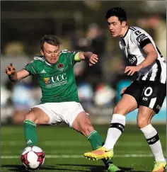  ??  ?? Cork captain Conor McCormack challenges Dundalk’s Jamie McGrath during their recent President’s Cup clash.