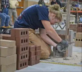  ?? SUBMITTED ?? Levi Shawley (Elyria) participat­es at the Holiday Masonry Skills Competitio­n.