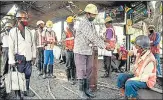  ?? PTI FILE ?? Employees at a coal mine in Dhanbad on April 25. n