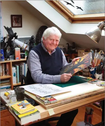  ??  ?? Don Conroy in his studio at his favourite desk where he does all his artwork.