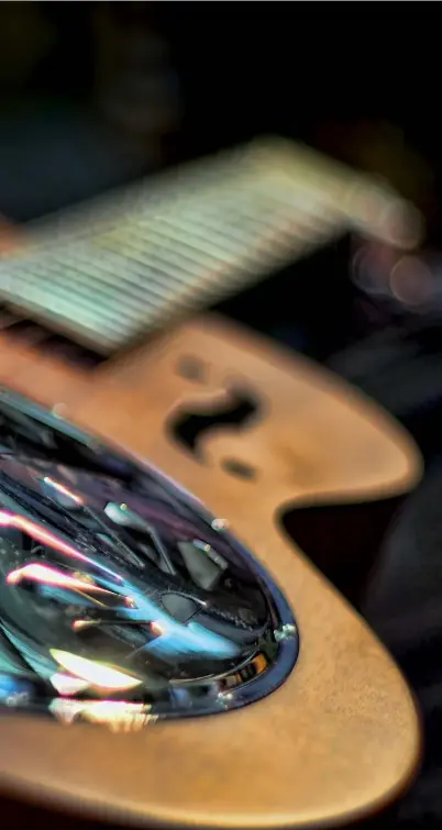  ??  ?? Gitarre Olympus OMD E-M5, Adapter – Minolta 1,4/50mm, Zwischenri­ng 10mm, ISO 200, Blende 1,4, 1/50s