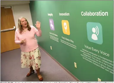  ?? (Arkansas Democrat-Gazette/Staci Vandagriff) ?? Veronica Soultz, director of call center operations, gives a tour of the RelateCare office on Thursday at Wildwood Centre in Sherwood.