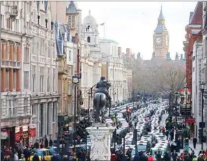  ?? JUSTIN TALLIS/AFP ?? Taxi drivers block Whitehall as they demonstrat­e in central London against Uber on February 10, 2016. The boss of Uber yesterday apologised for ‘mistakes’ made by the US ride-sharing app after London authoritie­s refused to renew its licence.