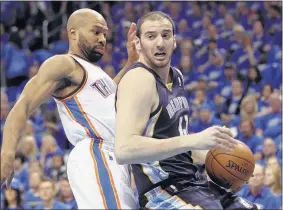  ??  ?? Thunder reserve guard Derek Fisher battles Grizzlies reserve center Kosta Koufos during Game 1. Bench-play was expected to give the Griz an advantage but both benches accounted for 25 points.