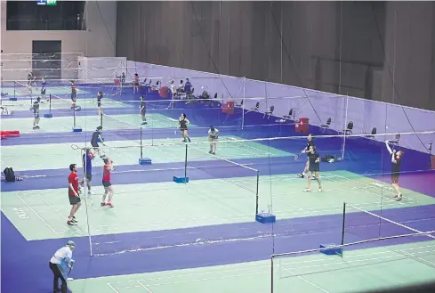  ??  ?? Players practise at Muang Thong Thani ahead of next week’s Yonex Thailand Open.