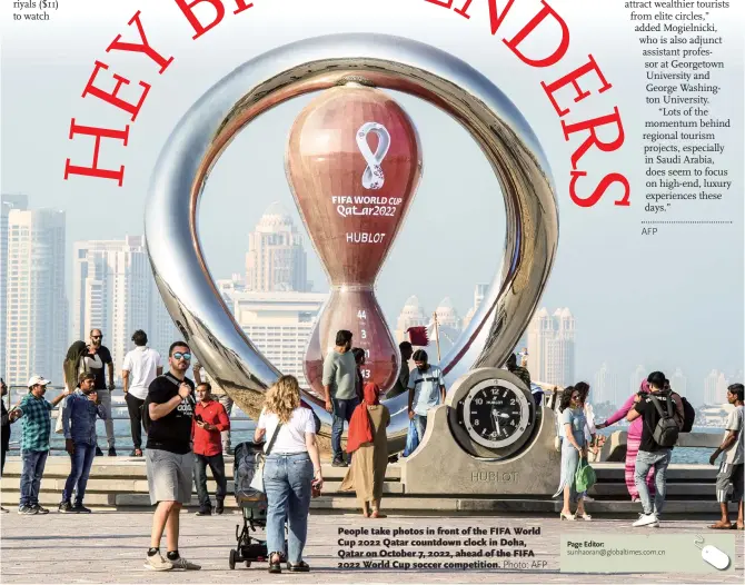  ?? Photo: AFP ?? People take photos in front of the FIFA World Cup 2022 Qatar countdown clock in Doha, Qatar on October 7, 2022, ahead of the FIFA 2022 World Cup soccer competitio­n.
Page Editor: sunhaoran@globaltime­s.com.cn