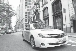  ?? ENVIRONMEN­TAL DEFENSE FUND AND GOOGLE EARTH ?? A Google Street View car equipped with low-to-the-ground methane-sniffing sensors can detect natural gas leaks, reporting coordinate­s and methane levels every half-second.