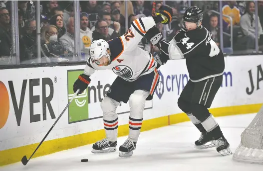  ?? GARY A. VASQUEZ/USA TODAY SPORTS ?? Oilers centre Leon Draisaitl moves the puck against Los Angeles Kings defenceman Mikey Anderson during Game 6 Thursday at Crypto.com Arena.