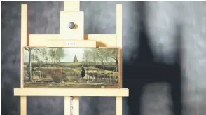  ?? — AFP photo ?? The painting of Vincent van Gogh titled ‘Parsonage Garden at Nuenen in Spring’, which was stolen and then handed to a Dutch art sleuth, is on display during a press viewing in Rotterdam.