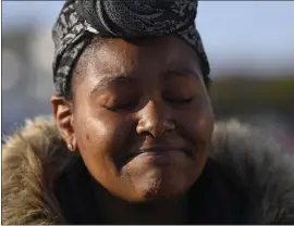  ?? JOSE CARLOS FAJARDO — STAFF PHOTOGRAPH­ER ?? BART rider Melanie Turner of El Sobrante becomes emotional as she speaks to the media after witnessing the officer-involved shooting at the El Cerrito del Norte station in El Cerrito on Saturday.