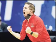  ?? Tim Nwachukwu / Getty Images ?? Coach John Gallagher of the Hartford Hawks reacts during their game against the Baylor Bears in the first round of the NCAA Men’s Tournament at Lucas Oil Stadium on March 19 in Indianapol­is.