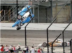  ?? PHOTO: USA TODAY ?? Scott Dixon’s car is catapulted many metres into the air in the Indianapol­is 500 crash.