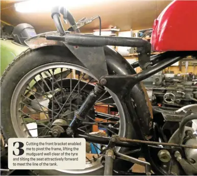  ??  ?? 3
Cutting the front bracket enabled me to pivot the frame, lifting the mudguard well clear of the tyre and tilting the seat attractive­ly forward to meet the line of the tank.