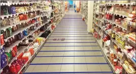  ??  ?? ruse: Taped lines on the floor affect the pace at which shoppers move