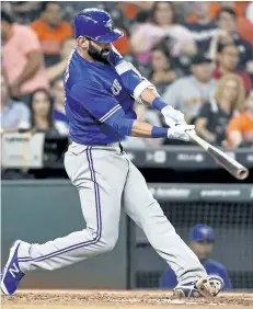  ?? THE ASSOCIATED PRESS FILES ?? Toronto Blue Jays’ Jose Bautista hits a solo home run, the 300th home run of his career, off Houston Astros starting pitcher Lance McCullers during a 2016 game in Houston. Terms like launch angle and exit velocity are creeping into the baseball...