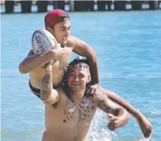  ?? Picture: GLENN HAMPSON ?? Caleb Hamiora and Jerome Johnson from Coolangatt­a battle for the ball.