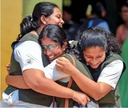  ?? — PTI ?? Students appearing for CBSE’s Class 12 biology Board paper in a light mood after they exit their examinatio­n centre in Chennai on Tuesday.