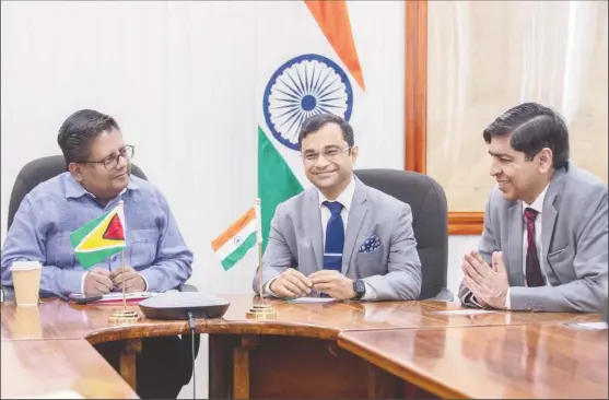  ?? ?? From left are Finance Minister Dr Ashni Singh, Indian High Commission­er to Guyana Dr Amit Telang and Deputy General Manager - Line of Credit Group, Sanjay Lamba (Ministry of Finance photo)