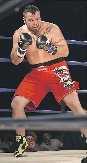  ?? PHOTOS: ED KAISER ?? ABOVE: Tim Hague manoeuvres during his ill-fated match with Adam Braidwood in the KO 79 boxing event in Edmonton on June 16. LEFT: A photo displayed at the celebratio­n of life for Hague.