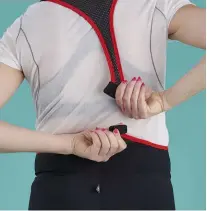  ??  ?? Below Magnetic clips on IRIS’s bib shorts