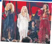  ??  ?? Karen Fairchild, Dolly Parton and Kimberly Schlapman performed at the Grammys at a tribute to the veteran country music singer