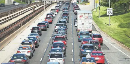  ?? 2015 PHOTO BY SCOTT OLSON, GETTY IMAGES ?? Some 35 million Americans will hit the road this weekend hoping to avoid traffic like this on Chicago’s Kennedy Expressway.