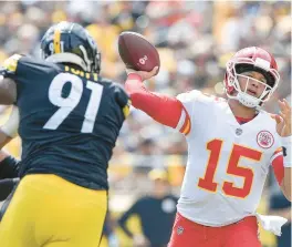  ?? JOHN SLEEZER/TNS ?? Stephon Tuitt (91) pursues Patrick Mahomes (15) during a 2018 game. Tuitt announced his retirement on Wednesday after playing eight seasons with the Pittsburgh Steelers. Prior to that, Tuitt was an All-American at Notre Dame.