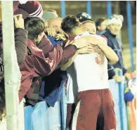  ??  ?? ■ David Foley celebrates with fans after equalising for South Shields against Lancaster City yesterday