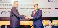  ??  ?? HNBGI Chief Business Officer, Corporate Lines, Chandana L. Aluthgama receiving the Gold Award