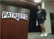  ?? STEVEN SENNE — THE ASSOCIATED PRESS ?? New England Patriots head coach Bill Belichick approaches the podium before taking questions from members of the media at NFL football training camp, Wednesday in Foxborough, Mass.