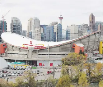  ?? DEREK LEUNG/ GETTY IMAGES ?? The Scotiabank Saddledome opened in 1983, which makes it one of the oldest arenas in the National Hockey League. Two of the older rinks — in Edmonton, where a new building opens next year, and Long Island, where the Islanders are moving to Brooklyn —...